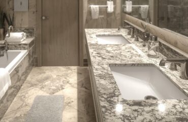 a btahroom with granite work surfaces